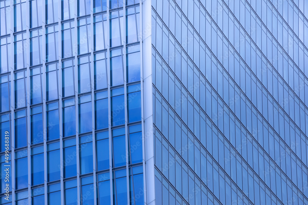 Close up view of modern skyscraper. Architecture background. Close up view of modern skyscraper. Architecture background.