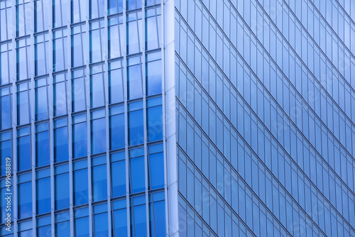 Close up view of modern skyscraper. Architecture background.