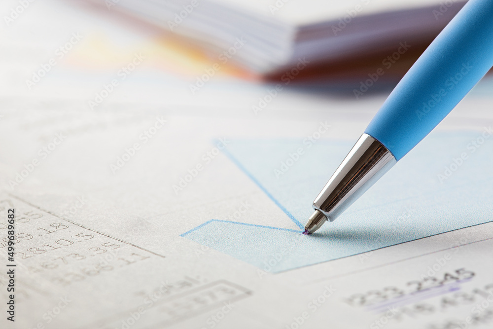 Accounting document with pen,color diagram and checking financial chart. Concept of banking, financial report and financial audit. In blue color. Accounting document with pen,color diagram and checking financial chart. Concept of banking, financial report and financial audit. In blue color.