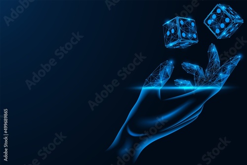 Hand throws up the dice. Online gambling game. Polygonal design of lines and dots. Blue background. 