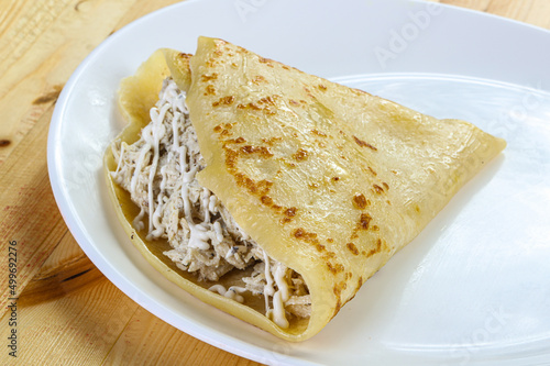 Pancake with chicken and sause