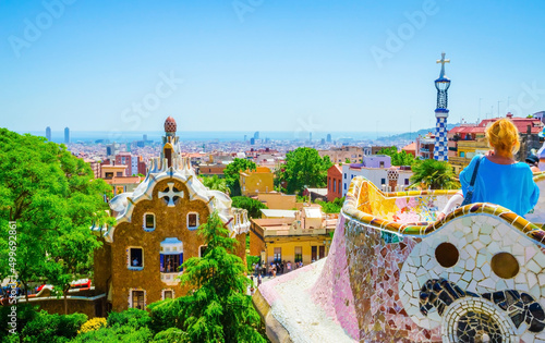 View of the city from beautiful public park Guell in Barcelona, Catalonia, Spain. Cityscape of Barcelona