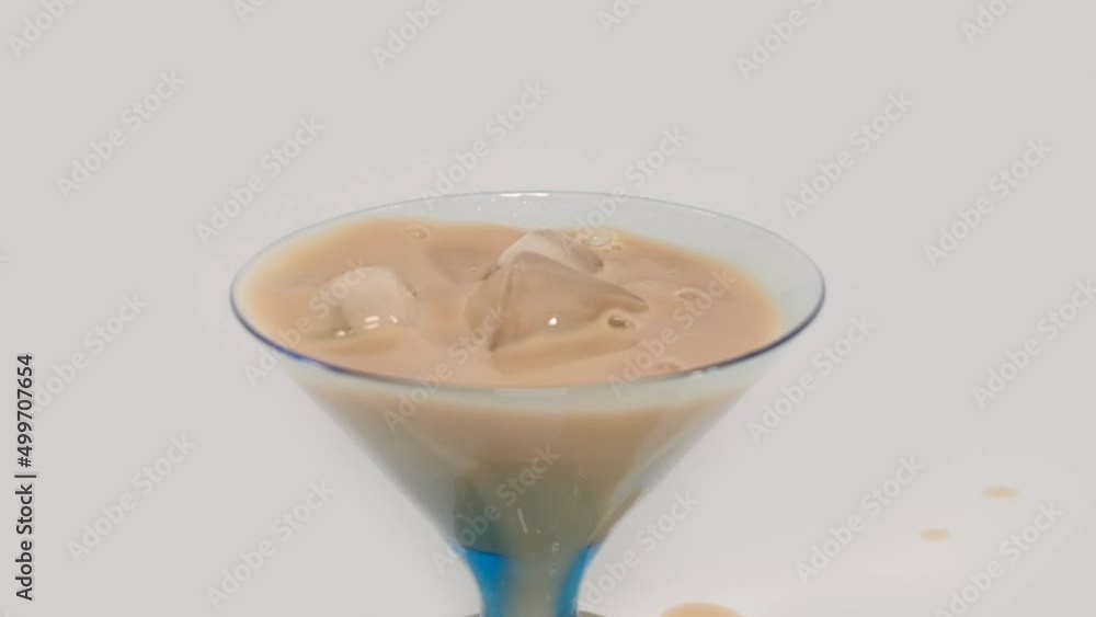ice coffee splash with ice cubes slow motion ice coffee splash with ice cubes slow motion