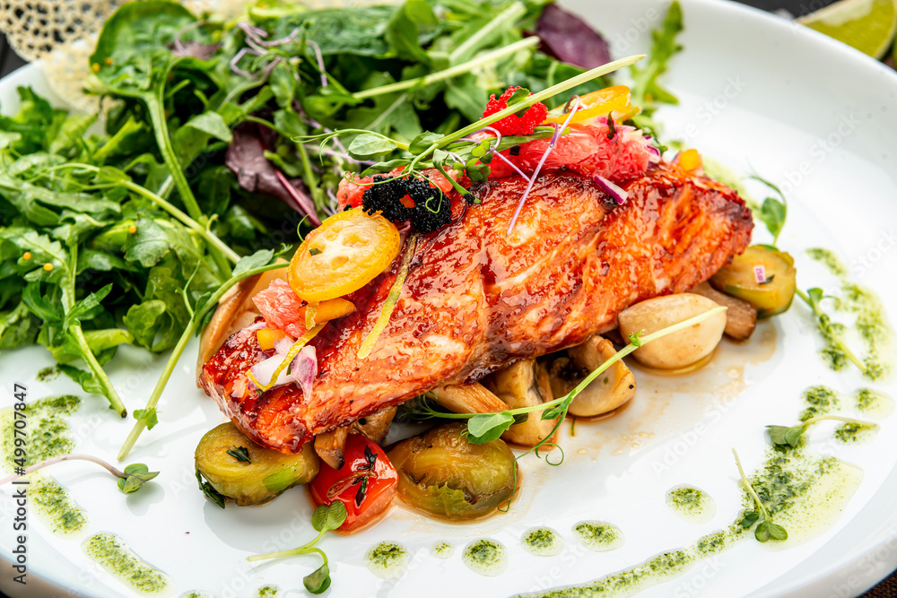 Grilled salmon fillet with vegetables mix. Grilled salmon fillet with vegetables mix.