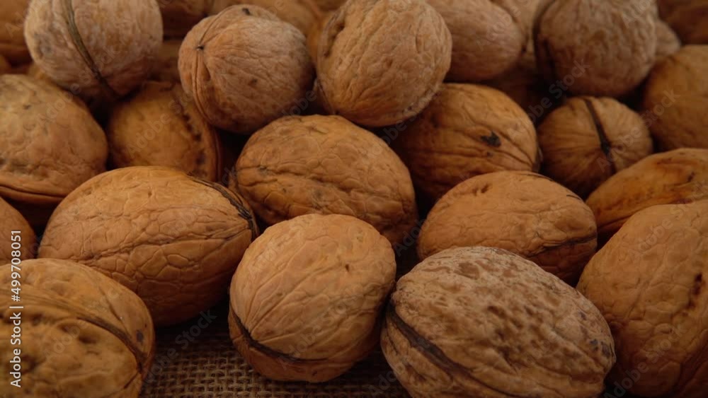 Walnuts on burlap. Shooting with a slider. Walnuts on burlap. Shooting with a slider.