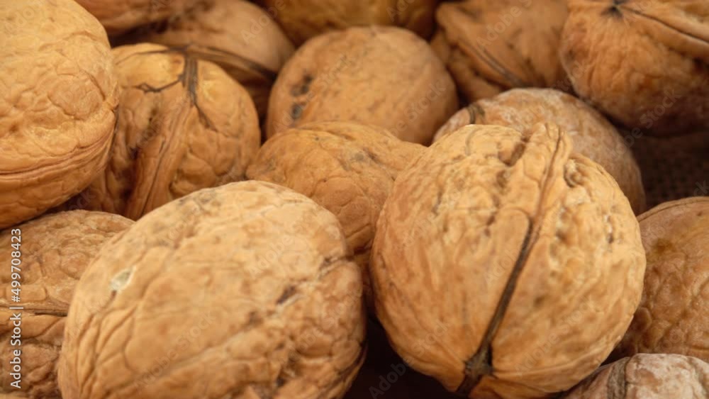 Walnuts on burlap. Shooting with a slider. Walnuts on burlap. Shooting with a slider.