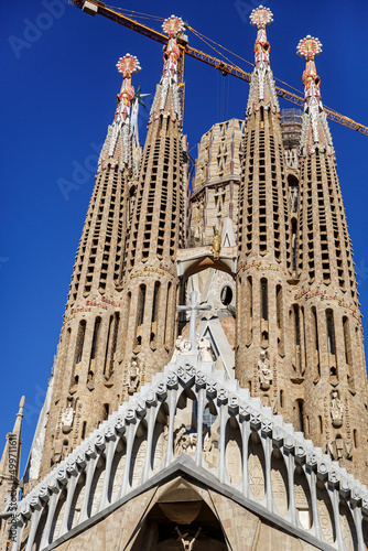 Construction of the Sagrada Familia in Barcelona. Cranes over the temple.