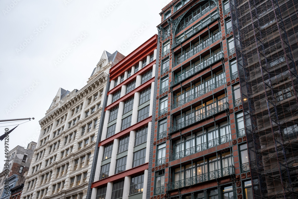 classic stone and brick building facades on Broadway, New York City