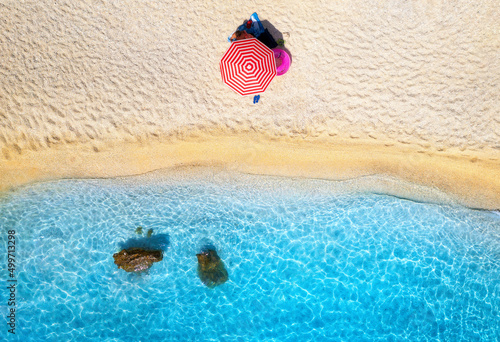 Aerial view of red umbrella...