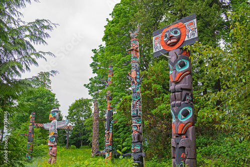 VANCOUVER - May 28, 2019: View of carved totem poles in Stanley Park, a popular lardmark and destination in British Columbia, Canada.