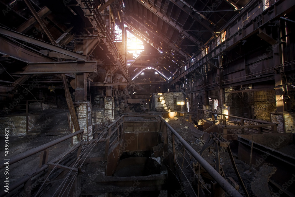 Old rusty abandoned metallurgical plant. Ruined blast furnace Old rusty abandoned metallurgical plant. Ruined blast furnace