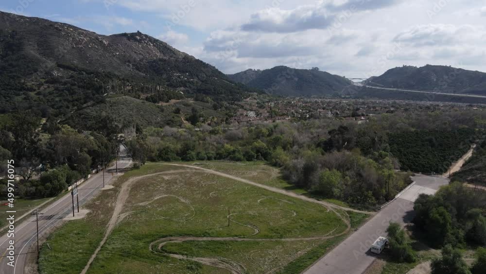 Aerial View of Pala Mesa, San Diego County, California USA. Green Landscape and Resort Under Hills, Drone Shot 60fps Aerial View of Pala Mesa, San Diego County, California USA. Green Landscape and Resort Under Hills, Drone Shot 60fps