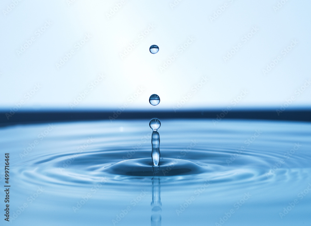 It only takes one. Abstract studio shot of a water droplet falling into a puddle of water. It only takes one. Abstract studio shot of a water droplet falling into a puddle of water.