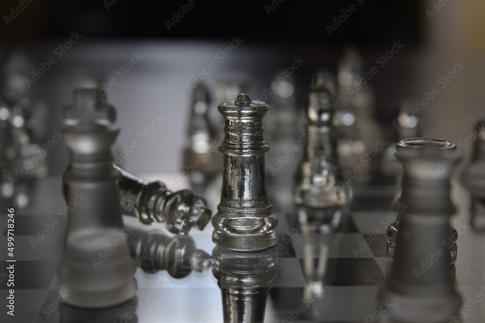 chess pieces on a chessboard chess pieces on a chessboard