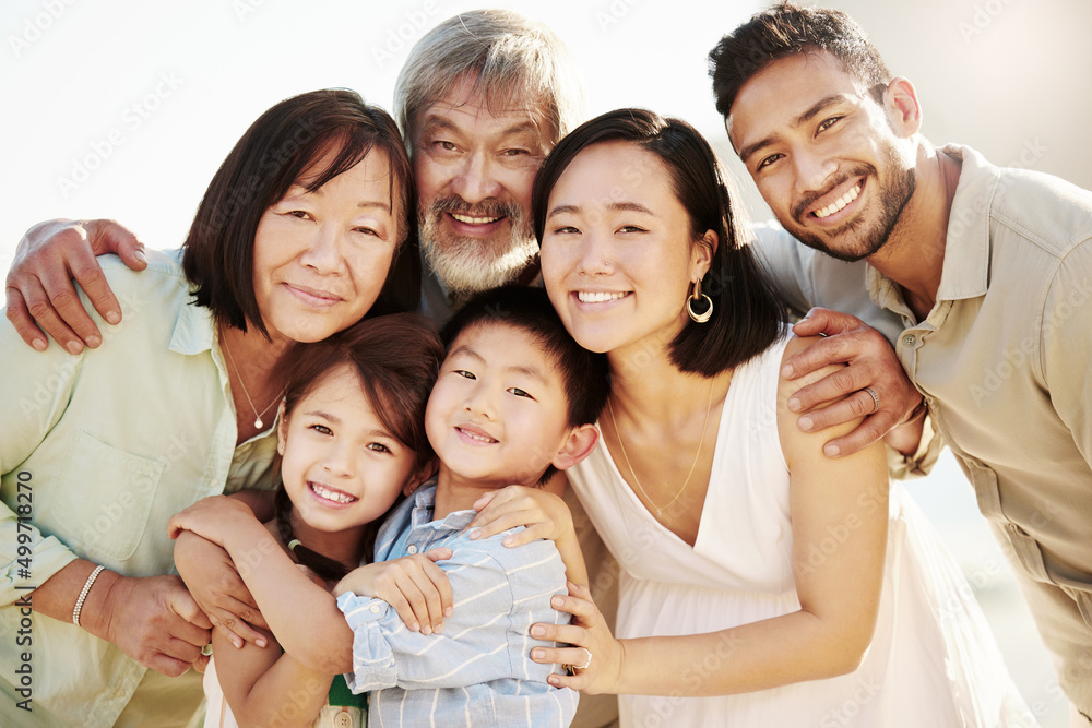One big happy family. Cropped shot of a happy diverse multi-generational  family at the beach. Photos | Adobe Stock