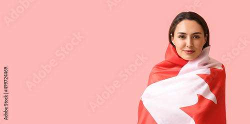 Beautiful young woman wrapp...