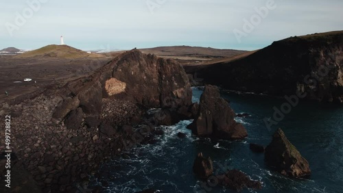 Drone Arcing Over Sea And Coastline Of KeflavK photo