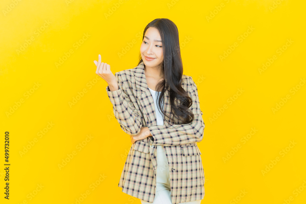 Portrait beautiful young asian woman smile with action Portrait beautiful young asian woman smile with action