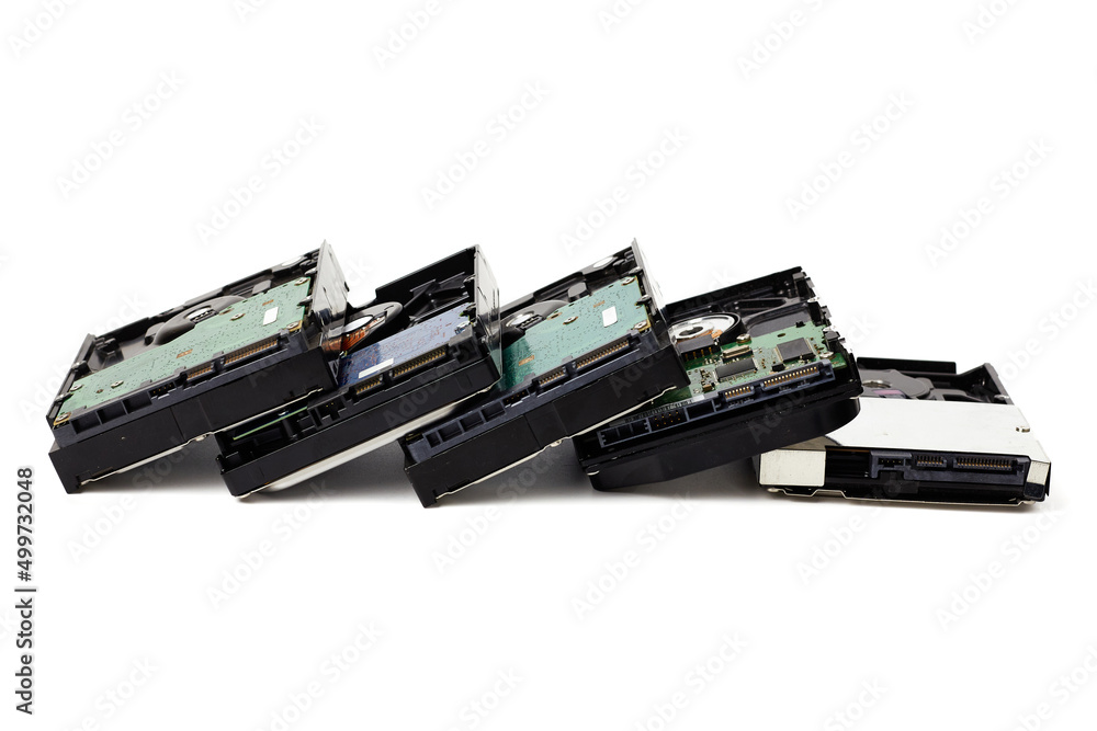 Set of old hard disk (HDD) for PC are no longer used isolated on white background. Set of old hard disk (HDD) for PC are no longer used isolated on white background.