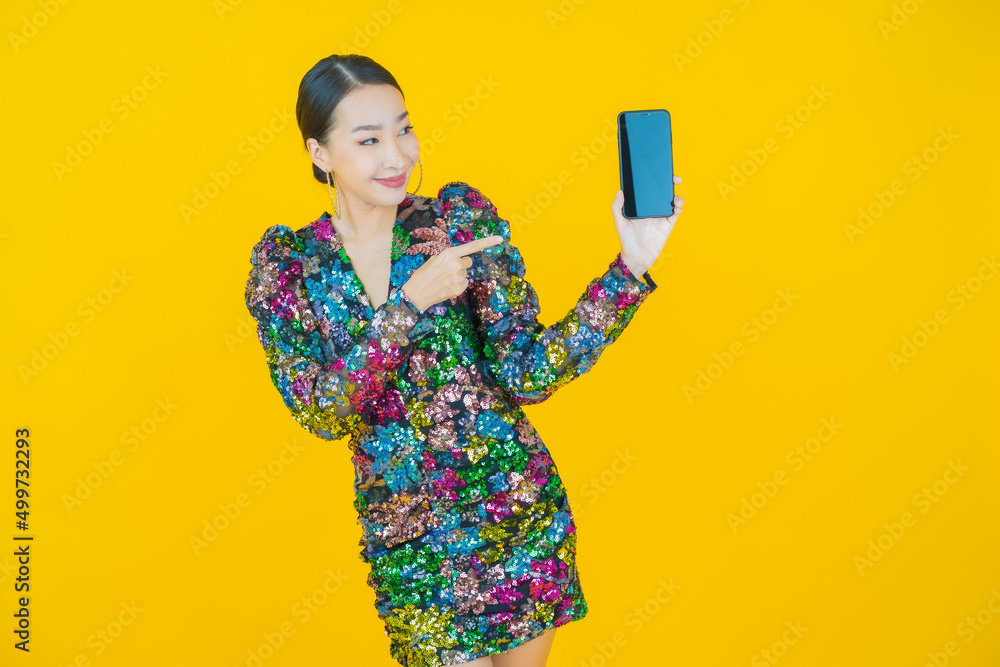 Portrait beautiful young asian woman smile with smart mobile phone Portrait beautiful young asian woman smile with smart mobile phone