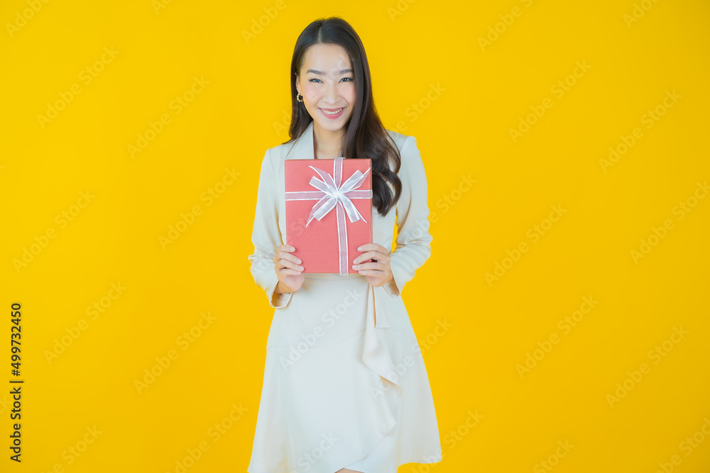 Portrait beautiful young asian woman smile with red gift box Portrait beautiful young asian woman smile with red gift box