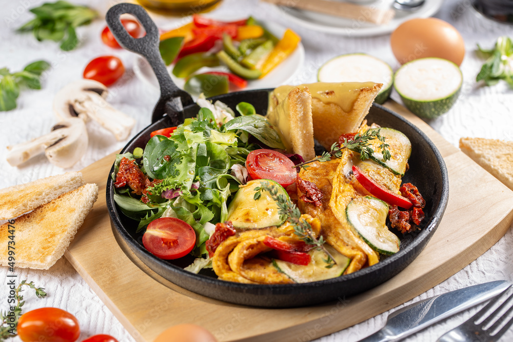 Omelet served with salad Omelet served with salad
