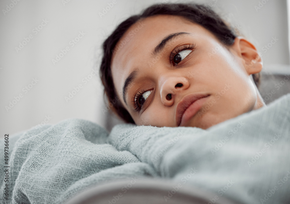 Can you stomach yourself when you thinkf what youve left behind. Shot of a young female experiencing depression at home. Can you stomach yourself when you thinkf what youve left behind. Shot of a young female experiencing depression at home.