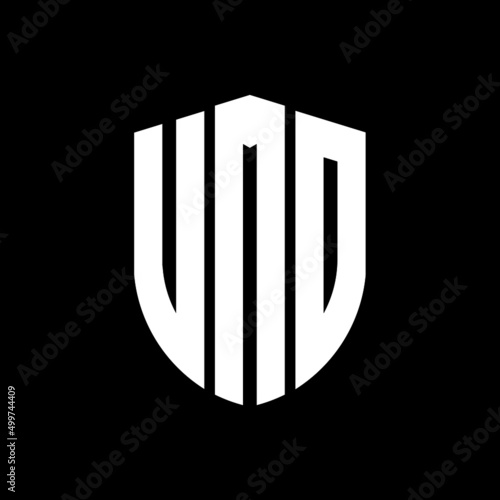 VMD letter logo design. VMD modern letter logo with black background. VMD creative  letter logo. simple and modern letter logo. vector logo modern alphabet font overlap style. Initial letters VMD  photo