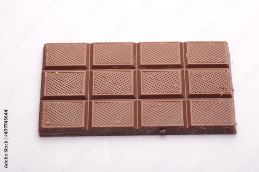 Milk chocolate bar isolated on white background from top view Milk chocolate bar isolated on white background from top view