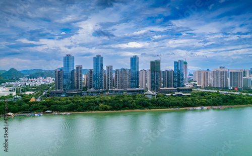 Urban scenery on both sides of Liujiang River in Liuzhou, Guangxi, China © Weiming