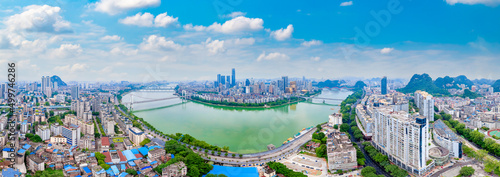 Urban scenery on both sides of Liujiang River in Liuzhou, Guangxi, China © Weiming