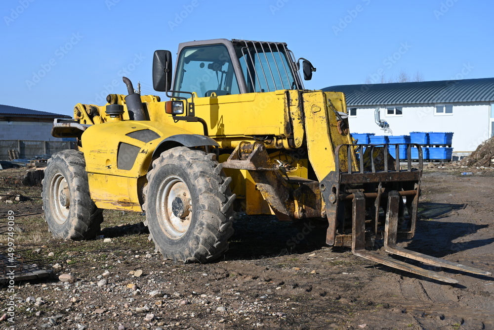 Photo tractor loader yellow outdoors