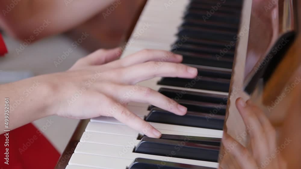 Fingers Girls Playing the Piano
Fingers Girls Playing the Piano