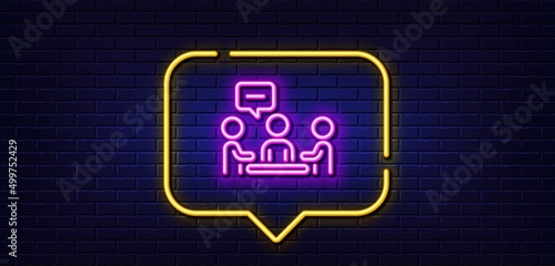 Neon light speech bubble. People chatting line icon. Business seminar sign. Job meeting symbol. Neon light background. People chatting glow line. Brick wall banner. Vector