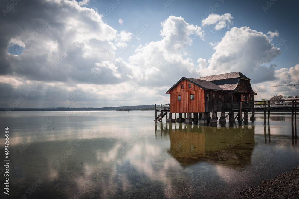 Fototapeta premium Traditional boathouse at lake Ammersee near Munich, Bavaria, Germany at sunrise.