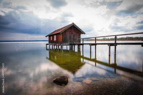 Bild auf Leinwand Traditional boathouse at lake Ammersee near Munich, Bavaria, Germany at sunrise