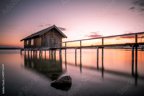 Fototapete Traditional boathouse at lake Ammersee near Munich, Bavaria, Germany at sunrise