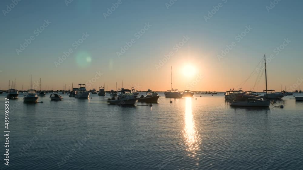 Boats floating in the bay during sunrise timelapse beautiful scenery Boats floating in the bay during sunrise timelapse beautiful scenery