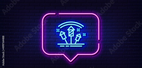 Neon light speech bubble. Fireworks rocket line icon. Pyrotechnic salute sign. Carnival celebration lights symbol. Neon light background. Fireworks rocket glow line. Brick wall banner. Vector