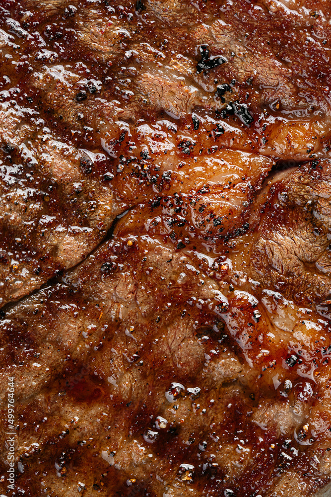 Closeup on juicy grilled beef steak texture Closeup on juicy grilled beef steak texture