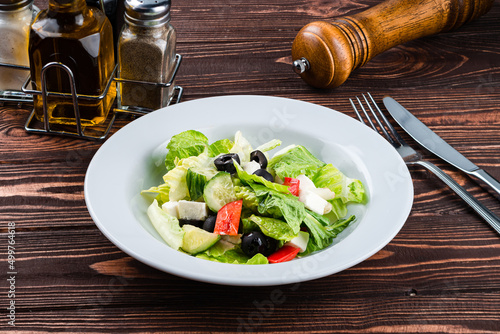 fresh salad with cheese and olives