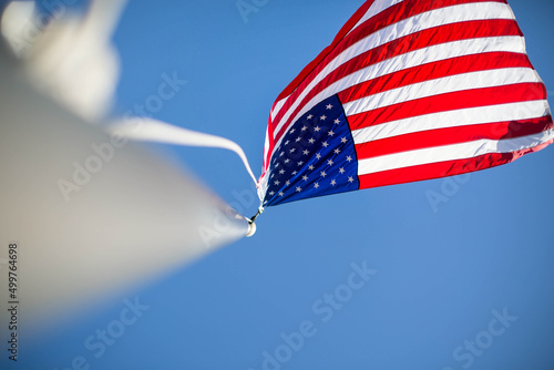 american flag and blue sky