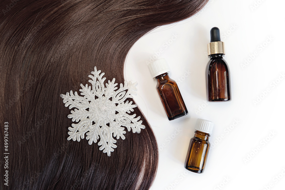 Obraz premium female hair isolated on white background. hair restoration and treatment after winter. professional hair care, beauty salon. Top view, copy space