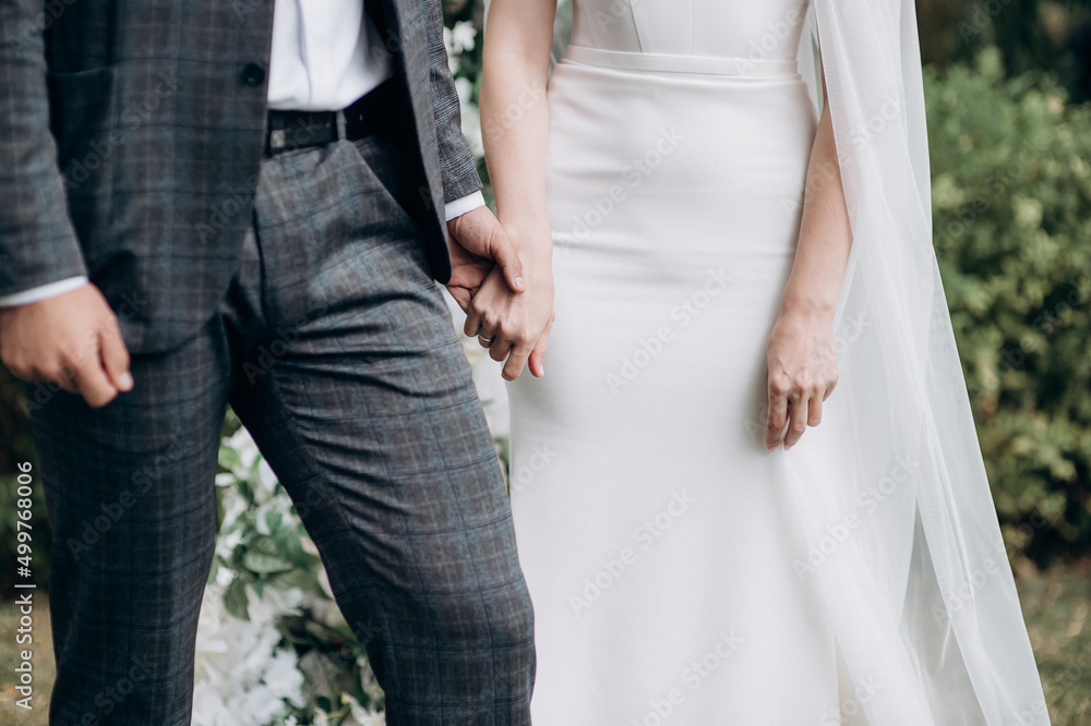 newlyweds in love holding hands newlyweds in love holding hands