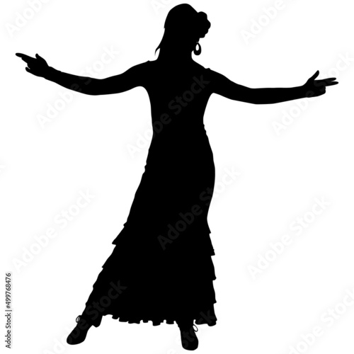 Black silhouette of slender flamenco dancer in beautiful dress