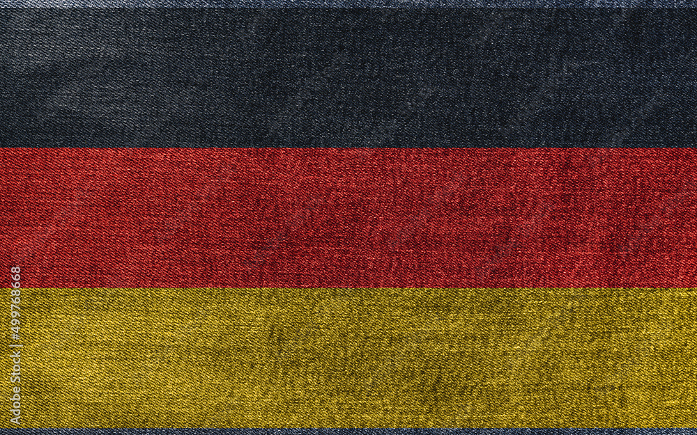 Grunge flag of Germany abstract background concept. Dark and grungy national flag of the Federal Republic of Germany on denim frabric texture. Grunge flag of Germany abstract background concept. Dark and grungy national flag of the Federal Republic of Germany on denim frabric texture.