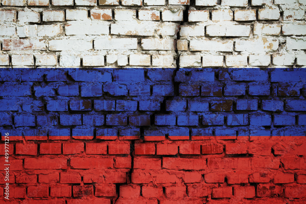 Flag of Russia with crack in the middle. Concept of default, crisis in economy of Russia because of economic, political sanctions, international isolation of the country Flag of Russia with crack in the middle. Concept of default, crisis in economy of Russia because of economic, political sanctions, international isolation of the country
