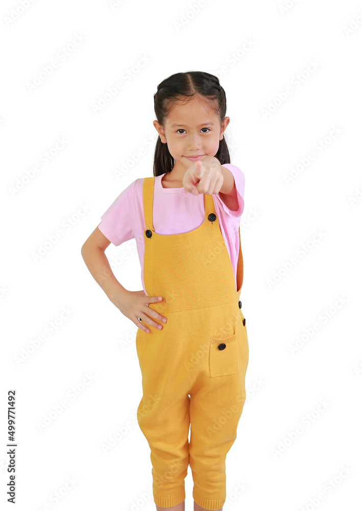 Asian little girl child pointing at camera and you isolated on white background. Asian little girl child pointing at camera and you isolated on white background.