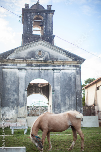 old church in cuba with horse