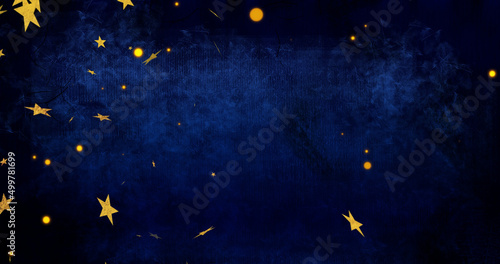 Image of yellow stars moving on blue background